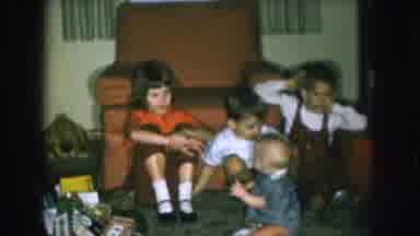 Nebraska USA (1957): Three Children In House & Playing With One Baby Boy