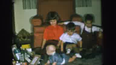 Nebraska USA (1957): The Three Children Are Playing With Born Baby And Enjoying