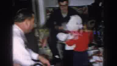 Nebraska USA (1957): Kid Holding Black And White Teddy Bear Enjoying With Gifts