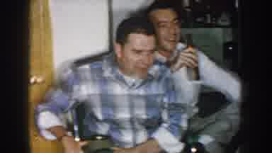 Nebraska USA (1957): Males Consuming Alcohol Watching Television While Women Take