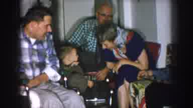 Nebraska USA (1957): A Child And Lady Cap Exchange Game With Seeing Peoples