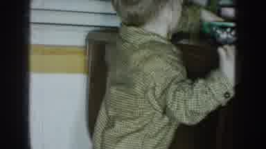 Nebraska USA (1957): Child Stealing A Piece Of Candy From A Candy Jar