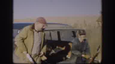Kansas USA (1958): Three Men On A Hunting Trip Standing Near The Back Of A Pickup