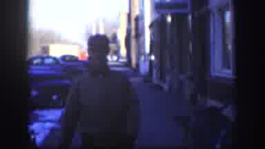 Kansas USA (1958): Man Walking Down The Street In The 1950'S, Stops In Front Of