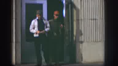 Kansas USA (1958): The Two Person Walking Outside Of The Building And Eat The Food