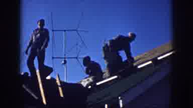 Nebraska USA (1958): Some Boys Working In A Top Of The Building