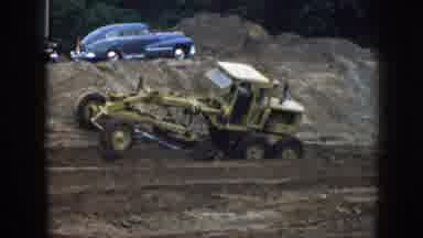 Nebraska USA (1958): Man Driving The Tractor