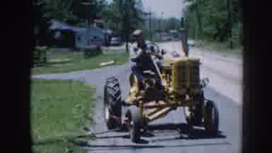 Nebraska USA (1958): A Old Man Was Driving With The Yellow Color Truck
