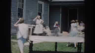 Nebraska USA (1958): People Cover Table With Tablecloth For Outdoor Picnic