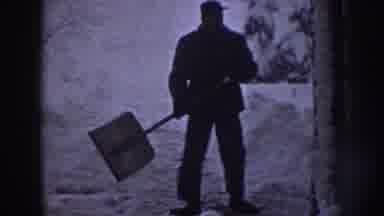 Nebraska USA (1958): One Person Cleaning The Road And Some Other Person Is