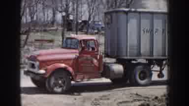 Nebraska USA (1959): Train Pulls Slowly Into Station Man Sitting Inside Parked Red