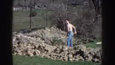 Nebraska USA (1959): Man Digging Dirt Hole Hot Summer Day