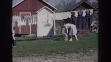 Nebraska USA (1959): Sunny Day Drying Clothes Grandmother Love Kid Toddler