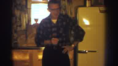 Nebraska USA (1959): A Person Talking To Other Person He Holding Something And