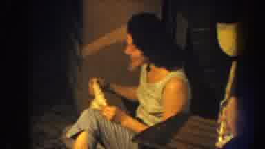 Nebraska USA (1959): Mom Grandma Crying Baby Folding Laundry Sitting Vintage Home