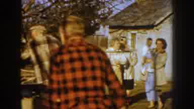 Nebraska USA (1959): Family Gathered Outdoors Removing Debris From Trees