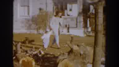 Nebraska USA (1959): Parents Playing And Strolling With Their Son On The Porch Of