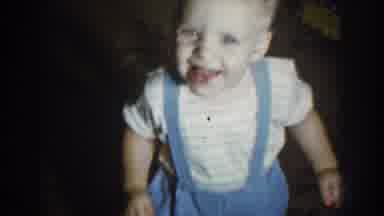 Nebraska USA (1959): Young Child Walks Smiling Towards Camera And Then A Shot Of A
