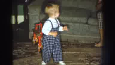 Nebraska USA (1959): The Child Is Doing Happily Dancing In Front Our Mother