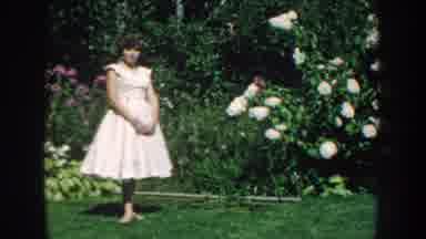 Nebraska USA (1959): Woman Standing In The Grass