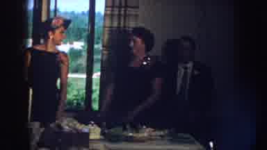 Nebraska USA (1959): Small Family Enjoying A Wedding And Laughing