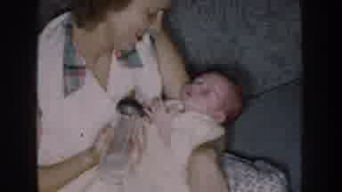 Nebraska USA (1959): Mother Feeds Her Baby