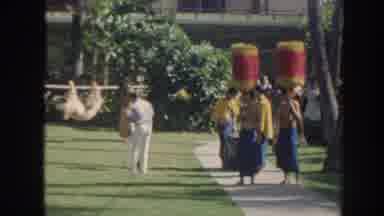 Hawaii USA (1961): People Dressed In Native Outfits Standing In The Middle Of A