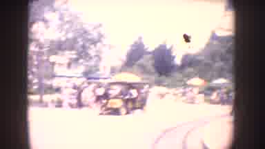 California USA (1962): The ANAHEIM Sign And A Crowd Of People On The Main Street