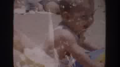 Anaheim California USA (1962): Baby Playing With A Ball On The Beach
