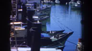 San Francisco California USA-1957: Boats At Dock With Fishermen's Grotto Sign
