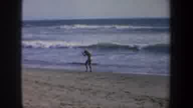 San Francisco California USA (1957): Lean Man Wearing Yellow Bathing Suit