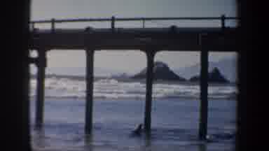 San Francisco California USA (1957): A Day At The Beach Watching Waves By The Pier