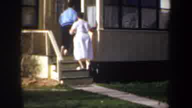 Portland Oregon USA (1957): A Mother And Son Is Going To Inside Home And Cat Is
