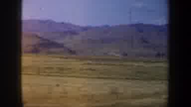 Portland Oregon USA (1957): A Mountainous Landscape Seen Through The Window Of A