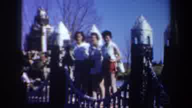 Portland Oregon USA (1957): Three Women On A Bridge Looking At A Gingerbread House