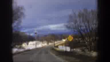 New Hampshire USA-1962: A Snow-Covered Highway and Open Field with Mountains
