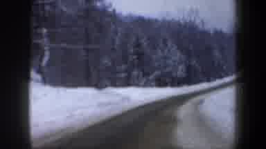 New Hampshire USA (1962): View Of Tree Lined Icy Highway On A Cloudy Winter Day