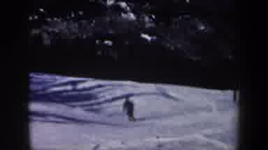 New Hampshire USA (1962): Two People Skiing Down Slopes Of A Mountain In The Snow