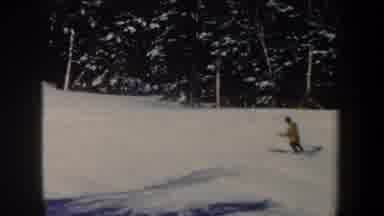 New Hampshire USA (1962): Two Individuals Skiing Around Trees Through A Snowy,