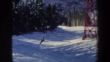 New Hampshire USA (1962): Person Skiing Down A Gentle Slope With Ski Lift Overhead