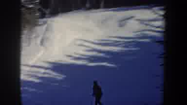 New Hampshire USA (1962): Man Skiing Down A Steep Hill Next To Trees