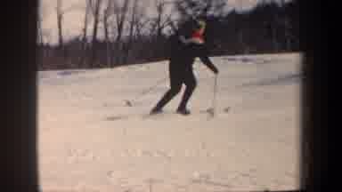 New Hampshire USA (1962): Man Patiently Learning How To Ski By Himself On The