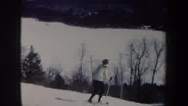 New Hampshire USA (1962): Person Wearing White Shirt Skiing Casually Down Snowy