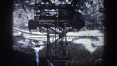 New York USA-1962: Red Cable Car Descending Mountain Side