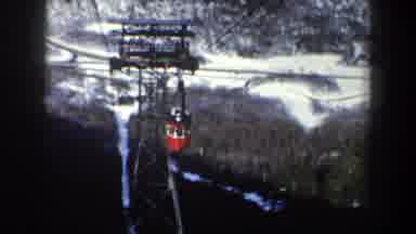 New York USA (1962): View Of Snow Covered Mountains And Red Sky Tram On Sunny