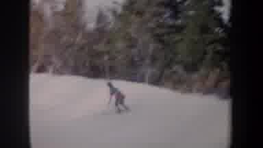New York USA (1962): Man Skiing On Skis In The Snow Down A Mountain Through Woods