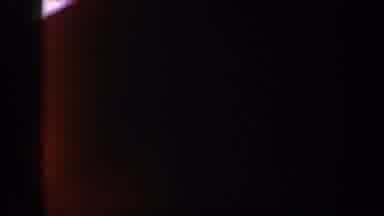 New York USA (1962): Various Rays Of Orange Light Spread Against A Dark Black