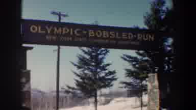 New York USA (1962): View Of Wooden Olympic Bobsled Run Sign In New York
