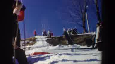 New York USA (1962): A Competition Skier Jumps A Snow Jump And Falls On Landing As