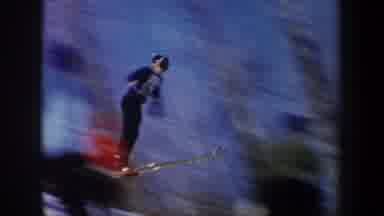 New York USA (1962): A Crowd In A Hill Watching A Man Doing Snowboard